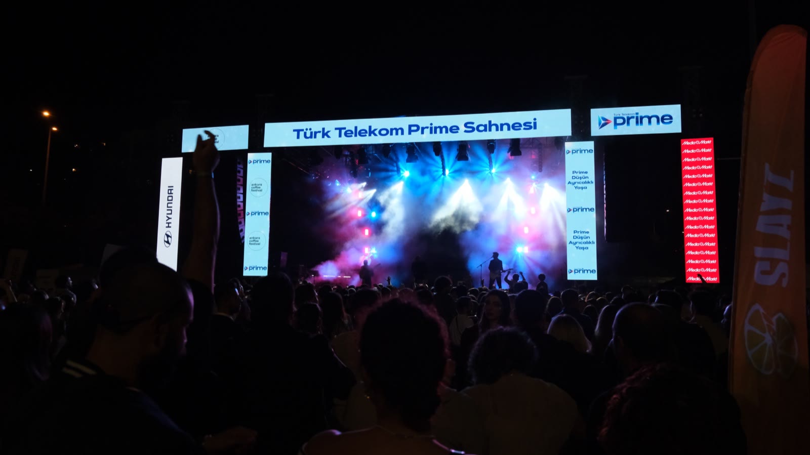 The stage at night seen from the crowd
