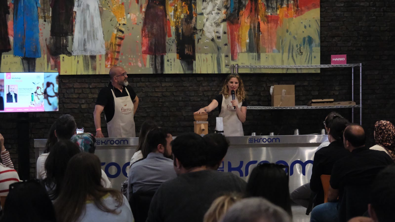 A cupping demonstration at the workshop counter