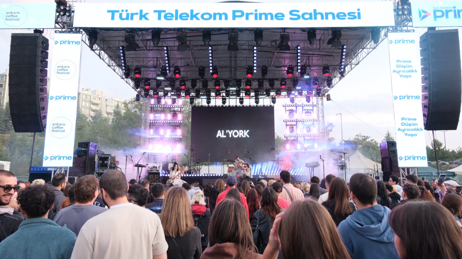 The main stage at dusk with the audience filling in
