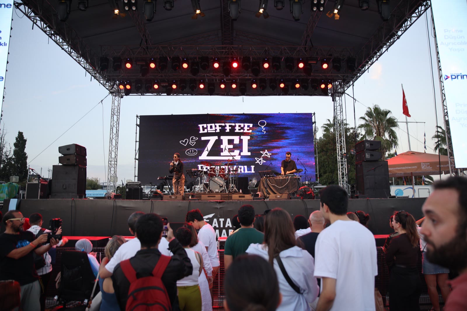 A band on the open-air stage in the early evening